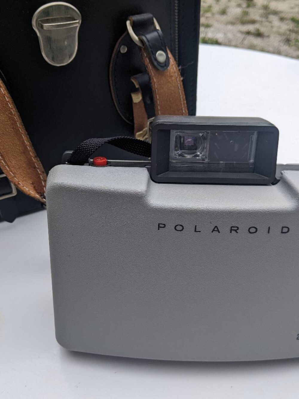 Polaroid 210 Land Camera With Case, Flashbulbs, Coldclip, And Other Accessories